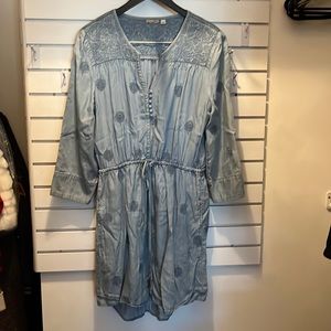 Size large dress from anthropology brand holding horses